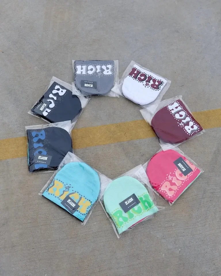 Assortment of custom printed t-shirts and hoodies, flat lay – made by Naxon Sports