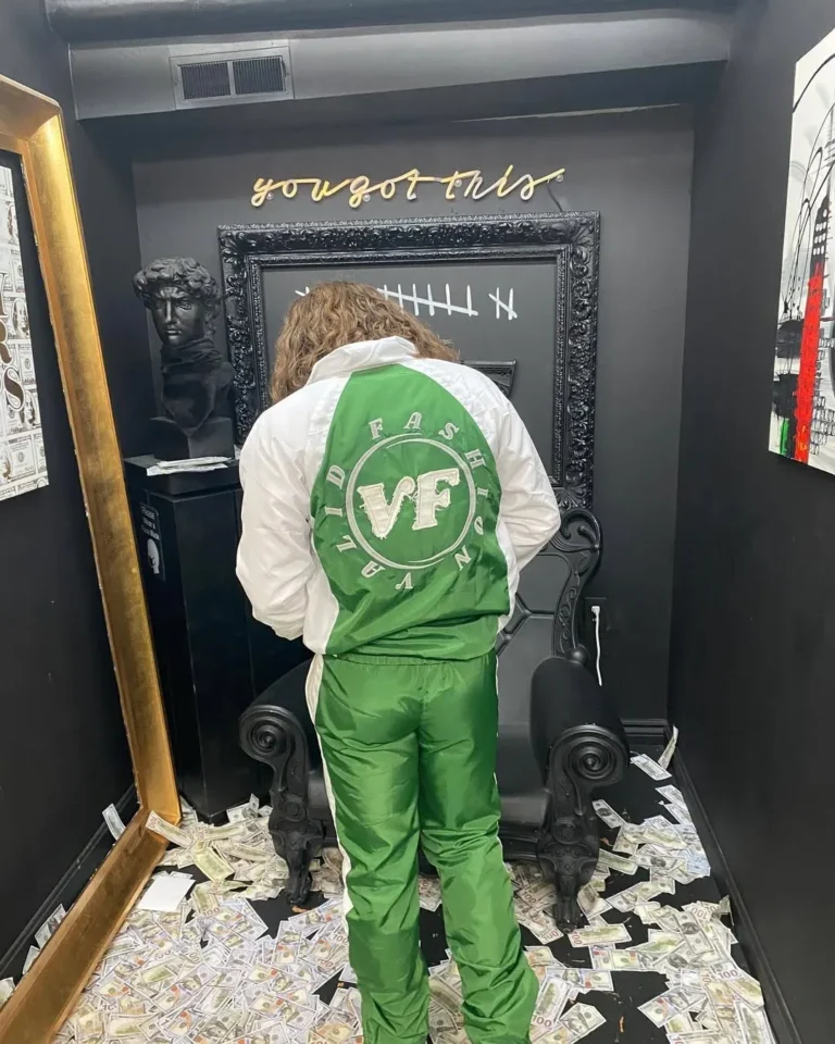 Back of a custom green and white jacket with logo – made by Naxon Sports