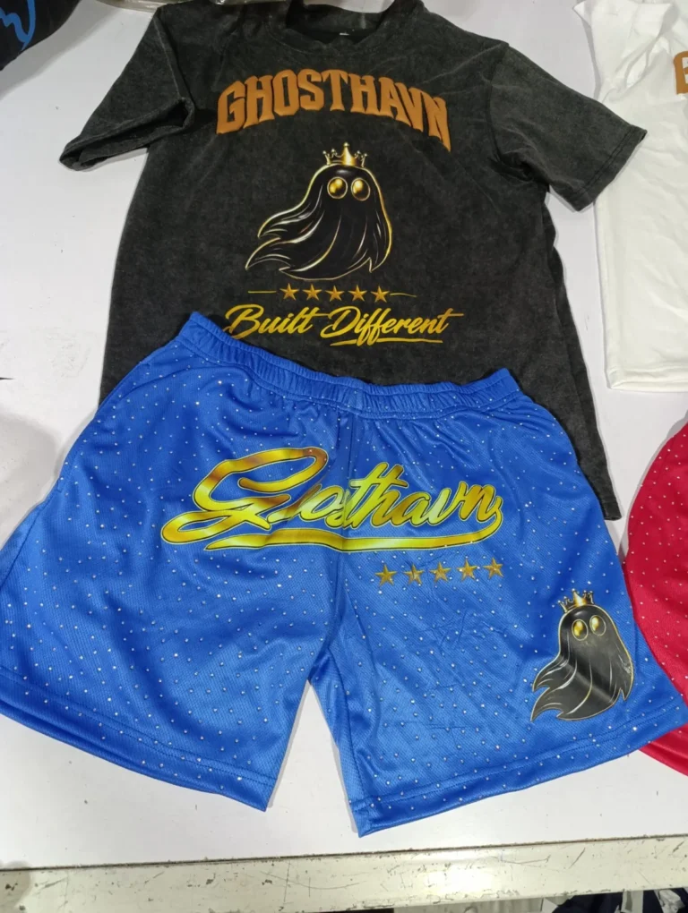 Custom black graphic t-shirt with blue printed satin shorts – made by Naxon Sports