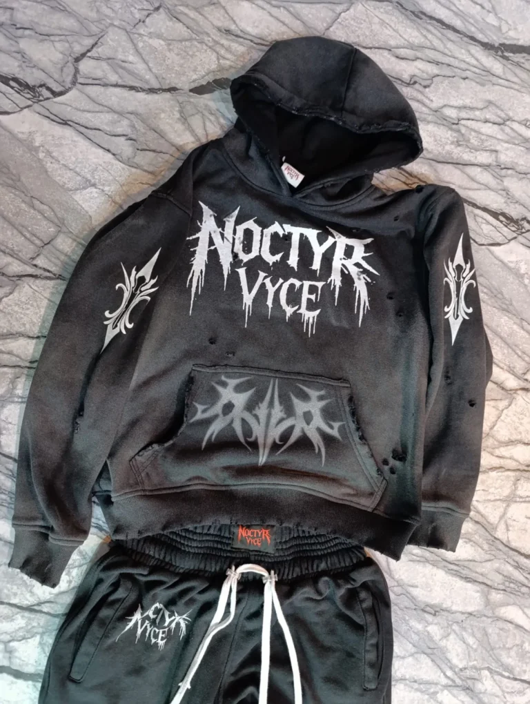 Custom black hoodie with front print and embroidery – made by Naxon Sports