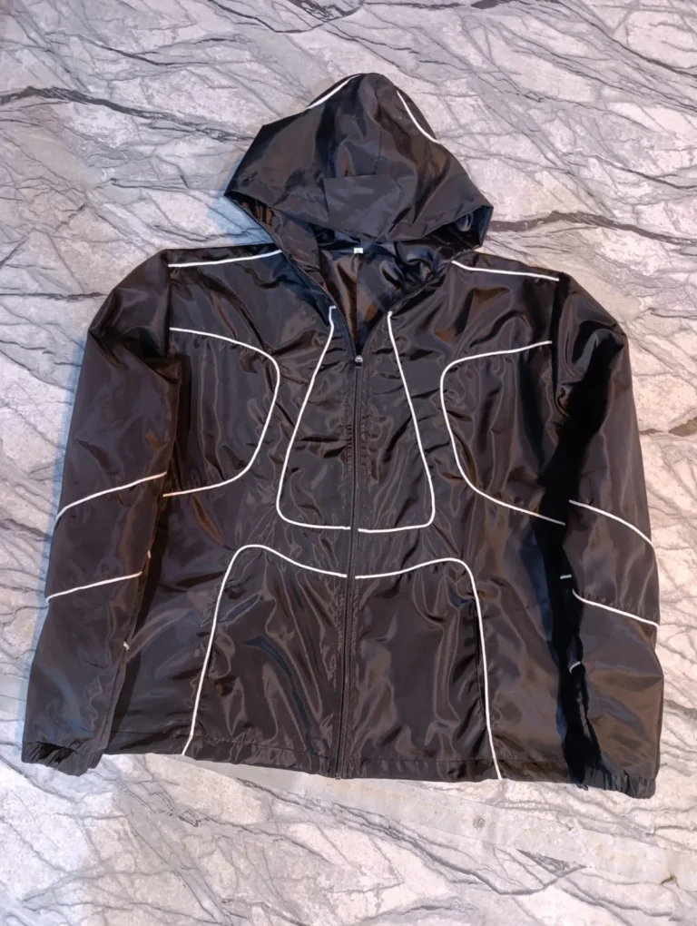 Custom black jacket with white piping – made by Naxon Sports