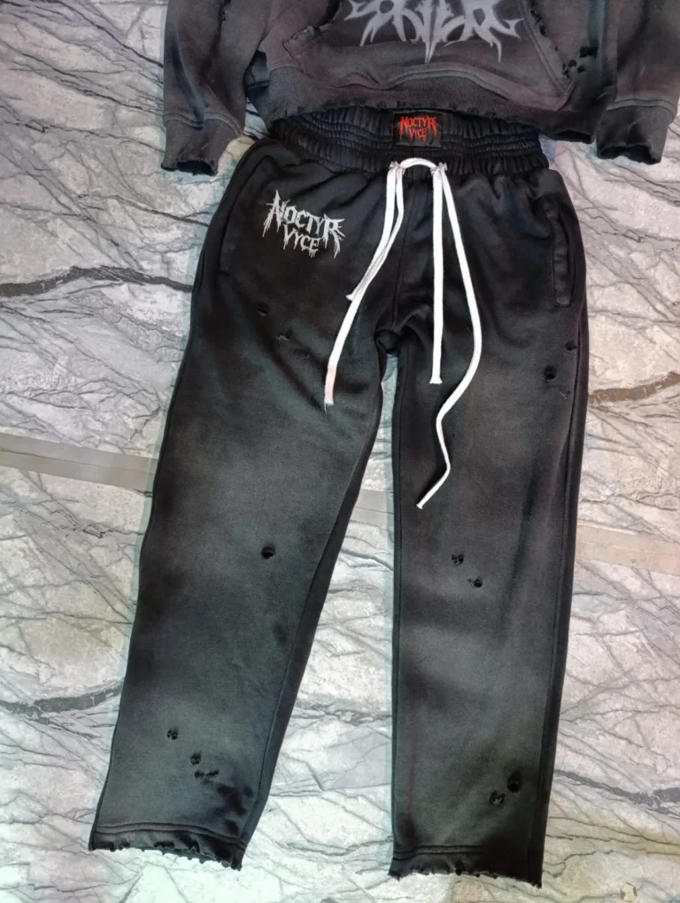 Custom black sweatpants with embroidered logo – made by Naxon Sports