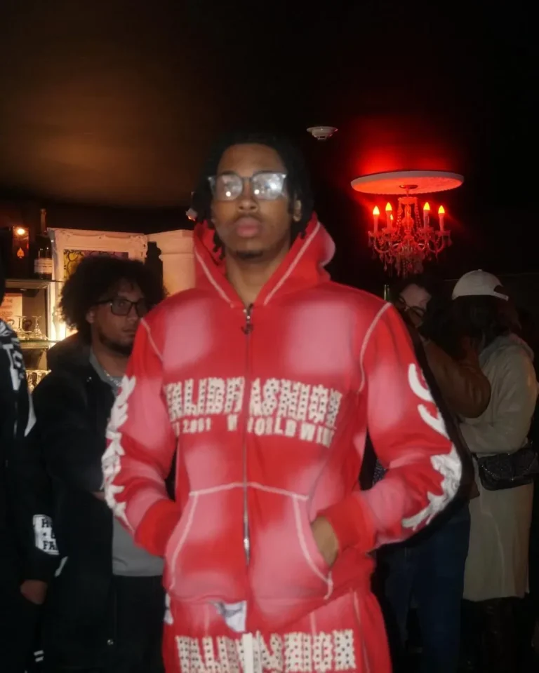 Custom red washed hoodie, client photoshoot – made by Naxon Sports