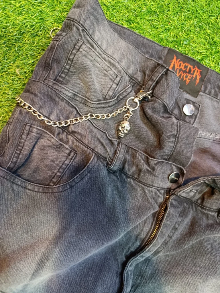 Custom washed jeans with chain detail – made by Naxon Sports