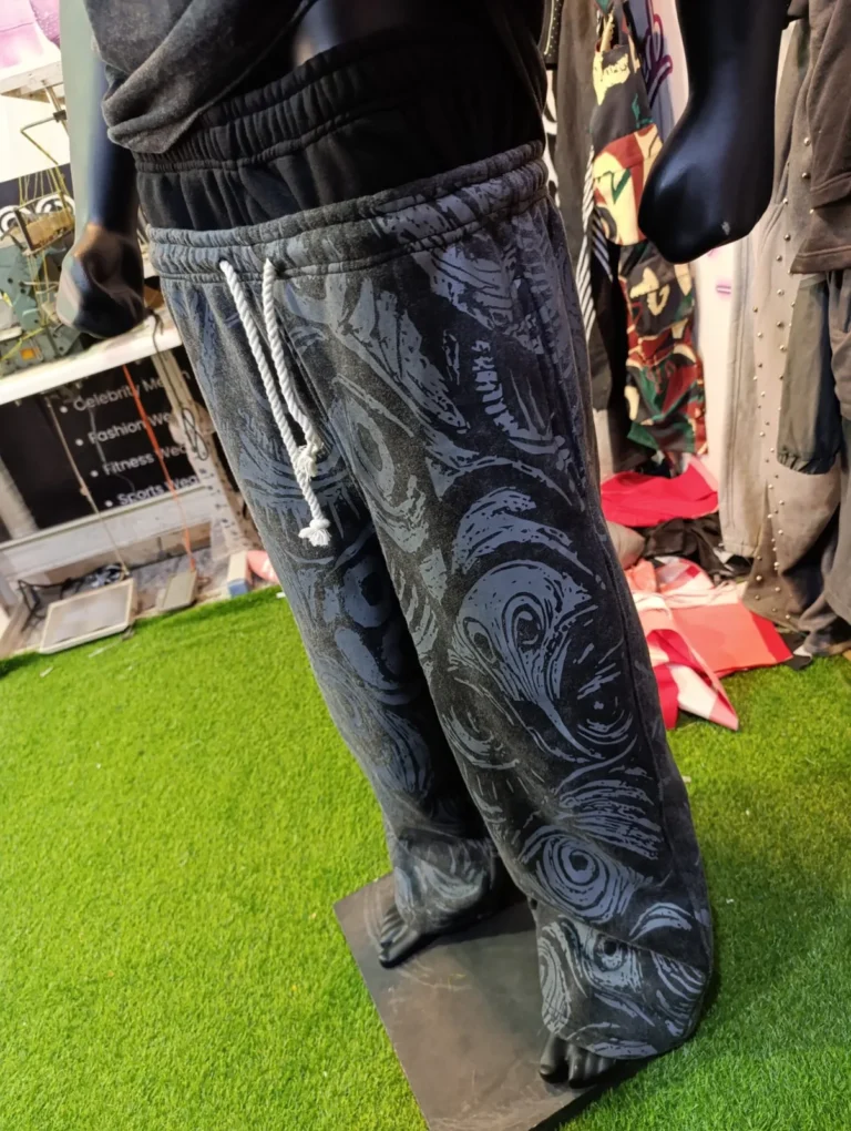 Custom washed printed jeans on a mannequin – made by Naxon Sports