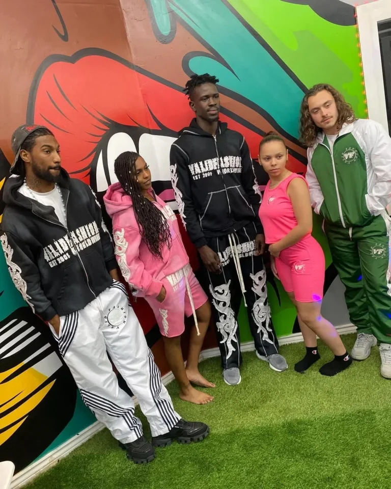 Group wearing custom tracksuits at a client event – made by Naxon Sports