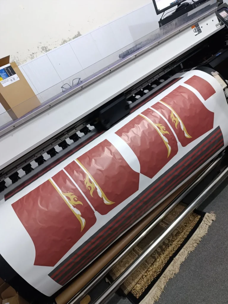 Sublimation printer printing a design on transfer paper – made by Naxon Sports