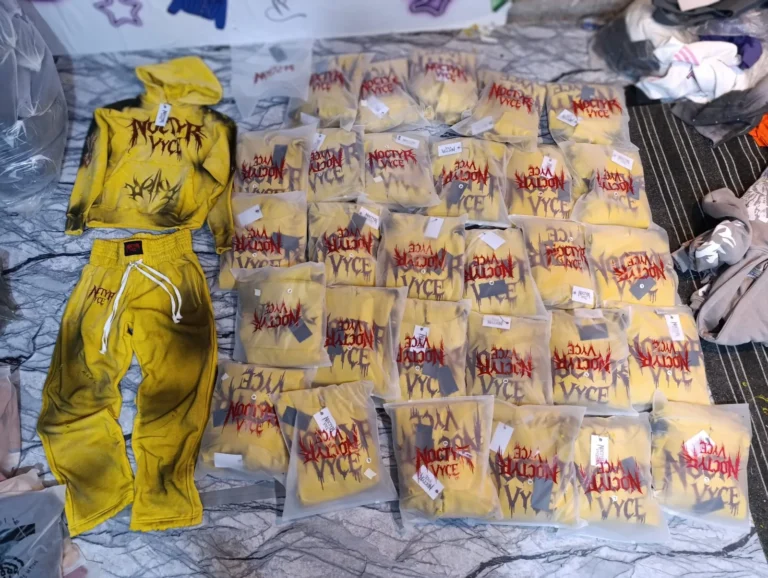 Yellow custom garments packed in polybags ready to ship – made by Naxon Sports
